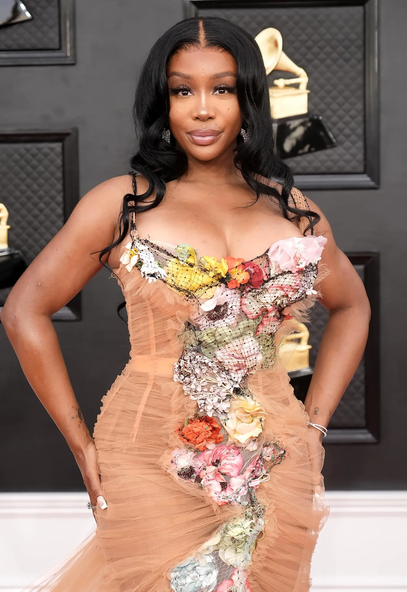 SZA Explains Why She Decided to Have Her Breast Implants Removed: 'It Was Painful'