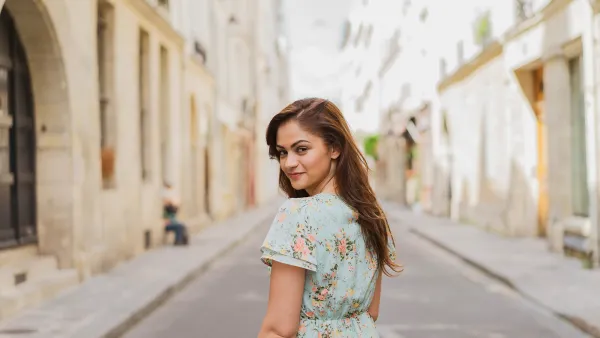 Smiling woman standing on street