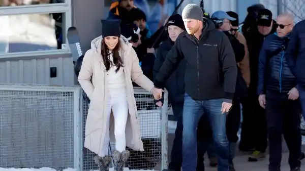 Meghan Markle wearing Frame jeans alongside Prince Harry.