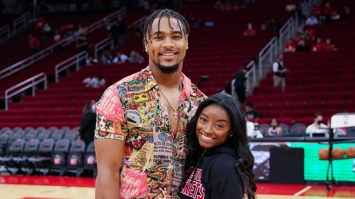 Feature Simone Biles and Jonathan Owens