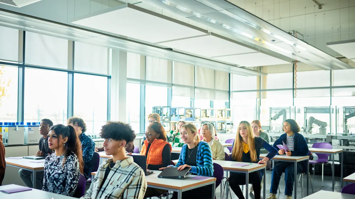 Students sitting in class at technical college