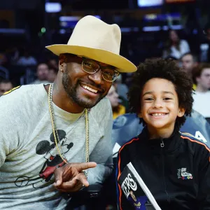 Taye Diggs Teases His and Ex Idina Menzels Teenage Son Walker Has a Beautiful Voice