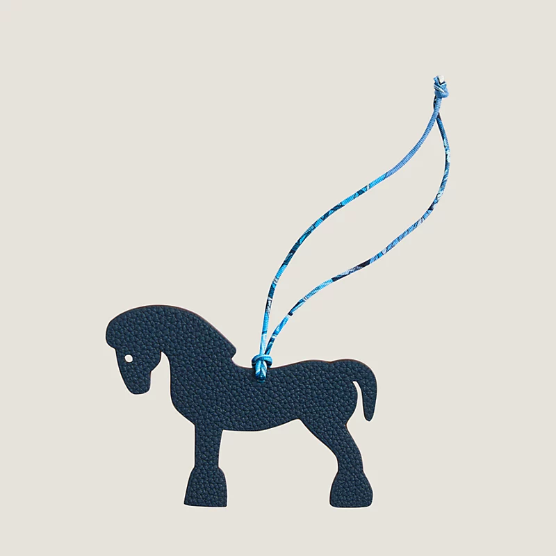 accessorize your bag with the charm trend