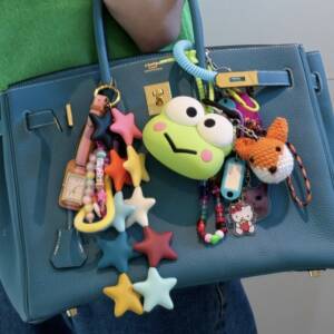 accessorize your bag with the charm trend