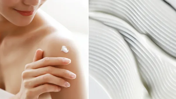 woman applying body lotion on shoulder