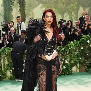 Dua Lipa Dominates the 2024 Met Gala Red Carpet in Stunning All Black Ensemble 724