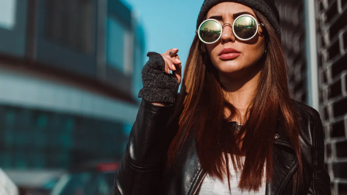 15 Chic Dark Sunglasses That Actually Block Out the Sun