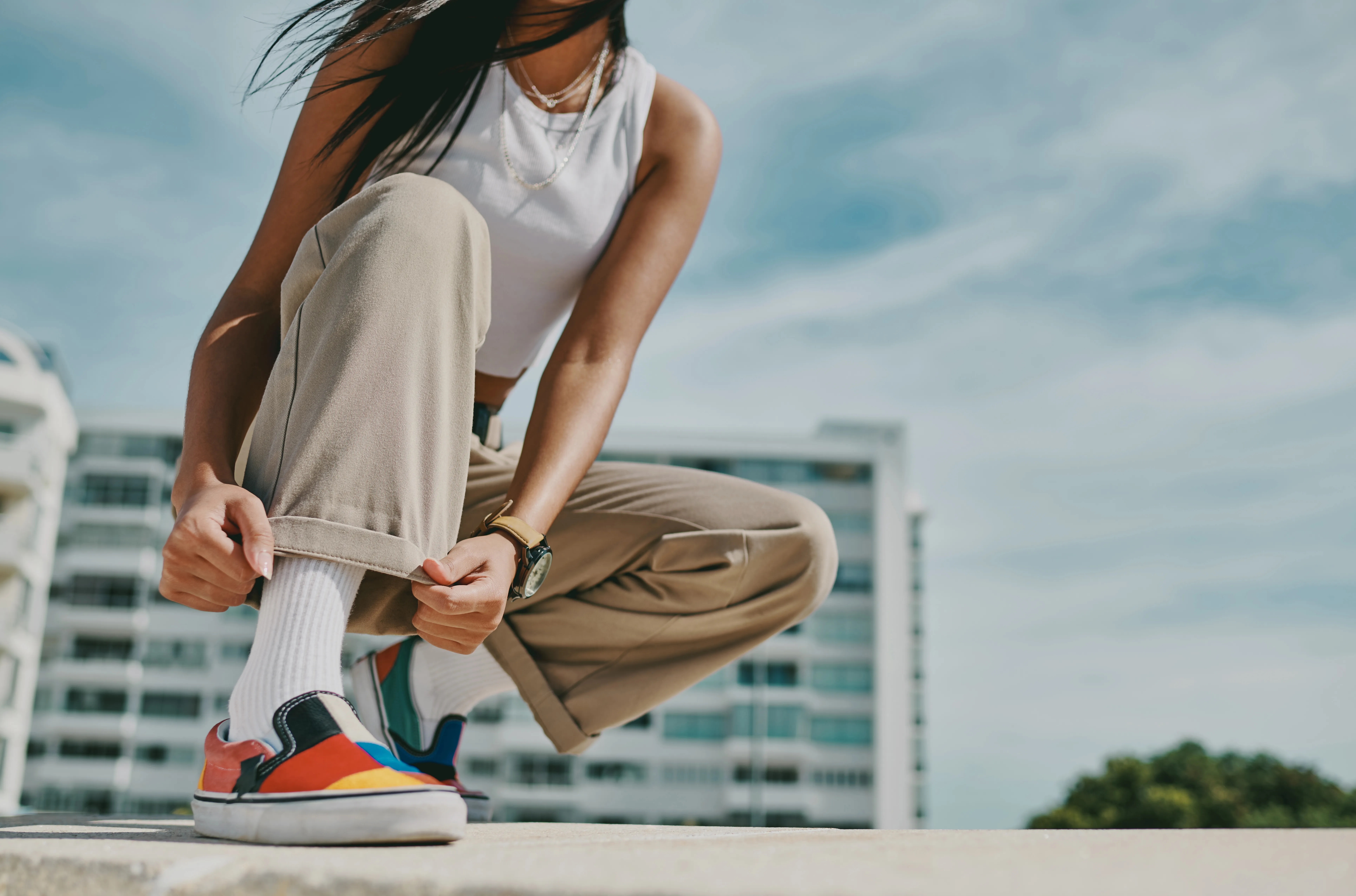 A woman checking out her shoe.