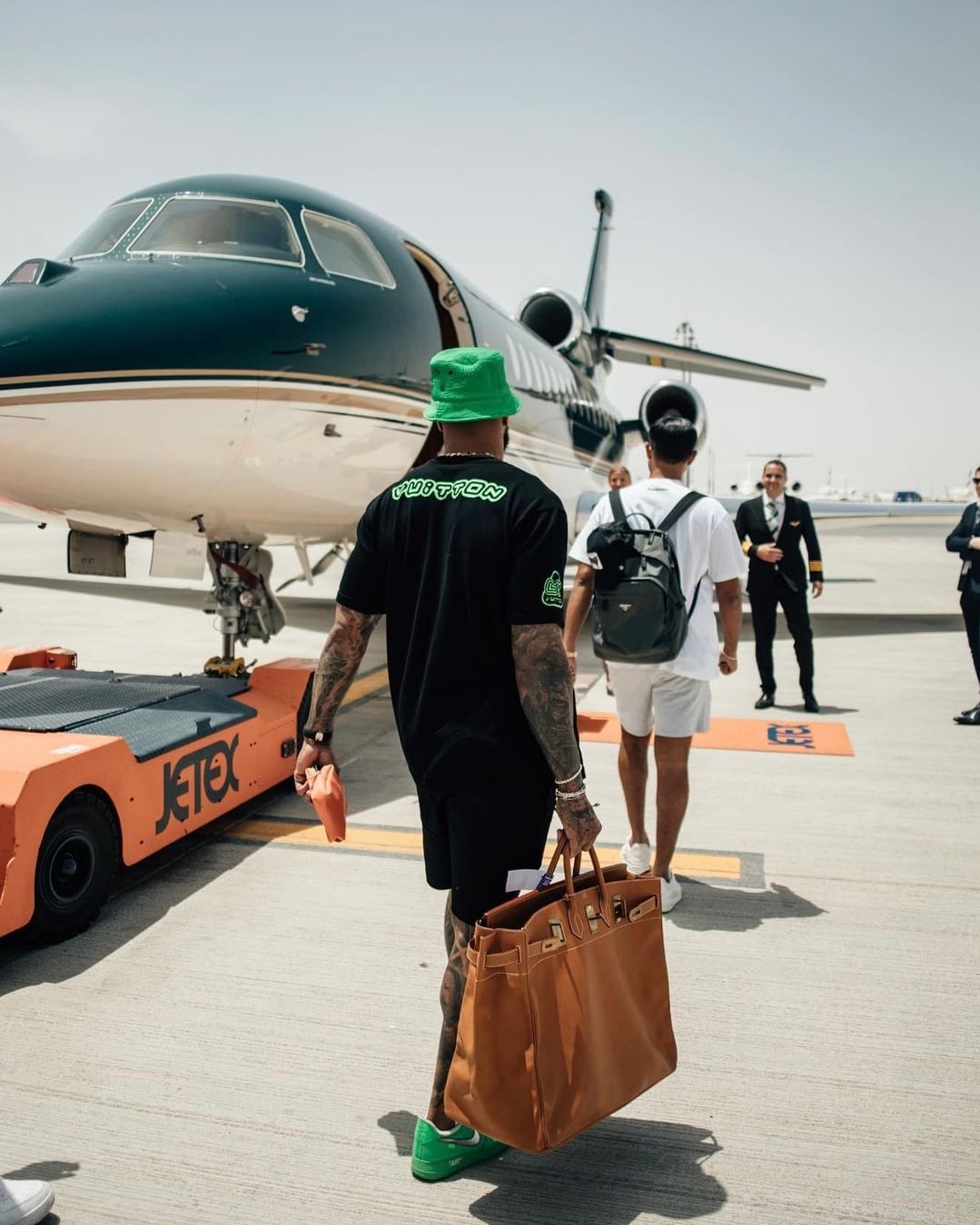 men celebs wearing hermes bags