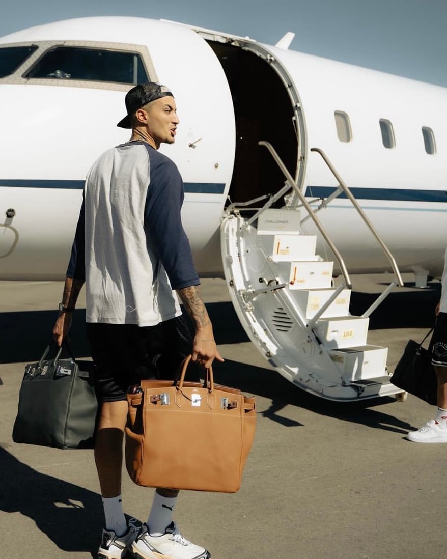 men celebs wearing hermes bags