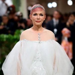 Michelle Williams Debuts Bold Pink Pixie Cut at the 2024 Met Gala