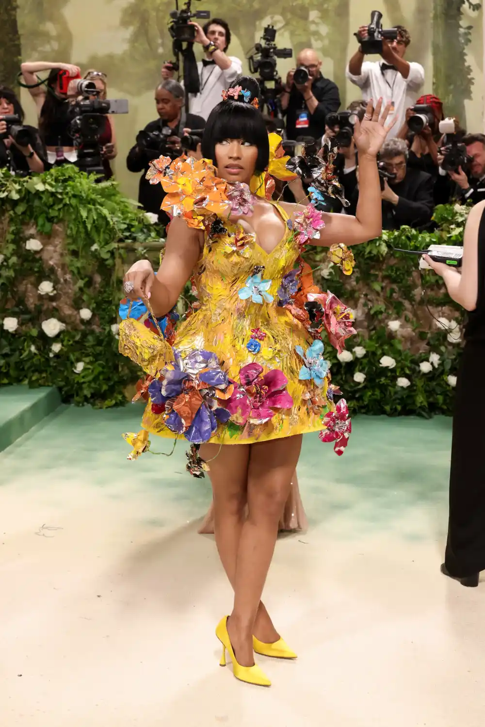 Nicki Minaj Puts On a Quirky Display in Canary Yellow Floral Appliqu&eacute; Dress at the 2024 Met Gala