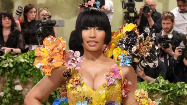 Nicki Minaj Puts On a Quirky Display in Canary Yellow Floral Appliqué Dress at the 2024 Met Gala