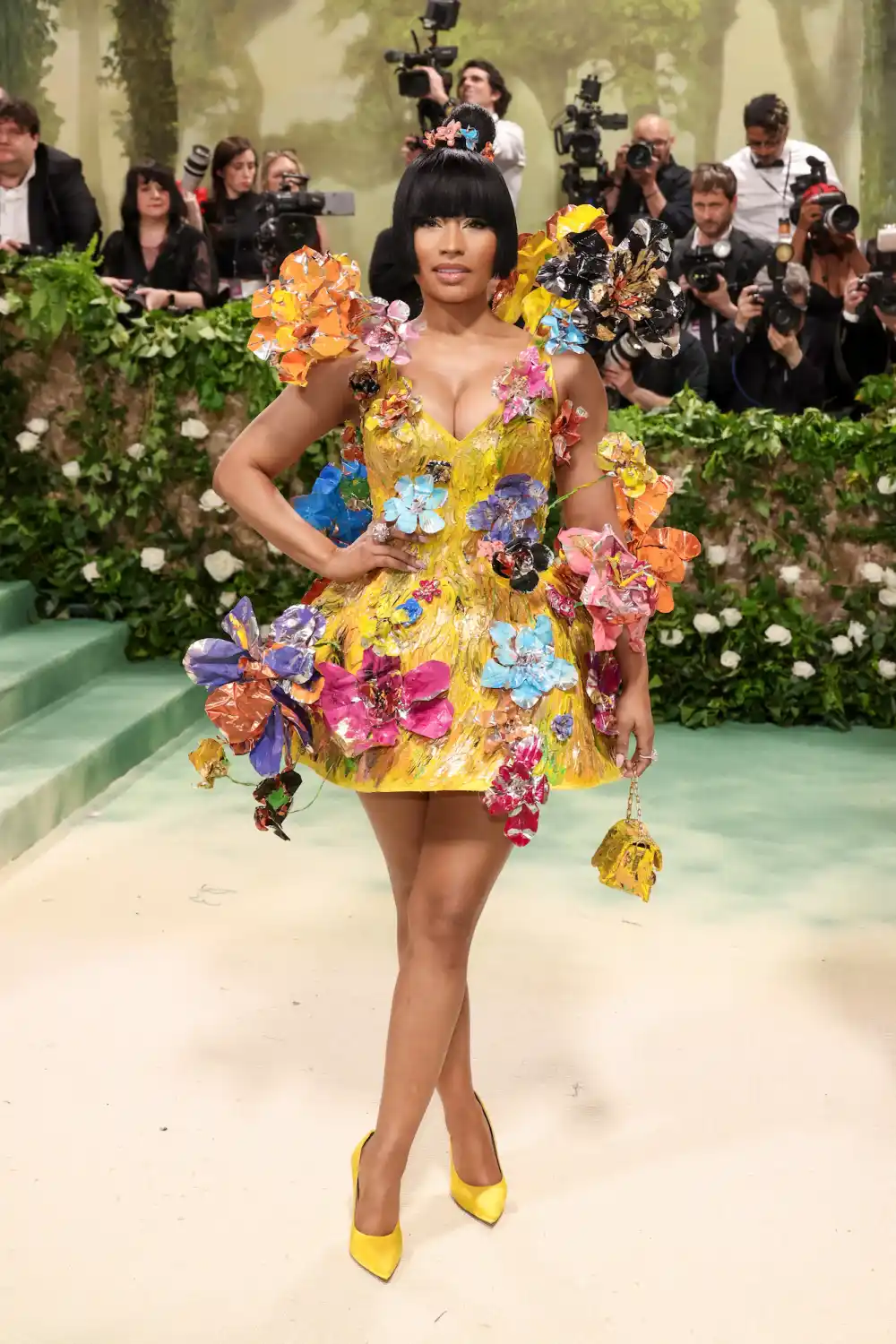 Nicki Minaj Puts On a Quirky Display in Canary Yellow Floral Appliqu&eacute; Dress at the 2024 Met Gala