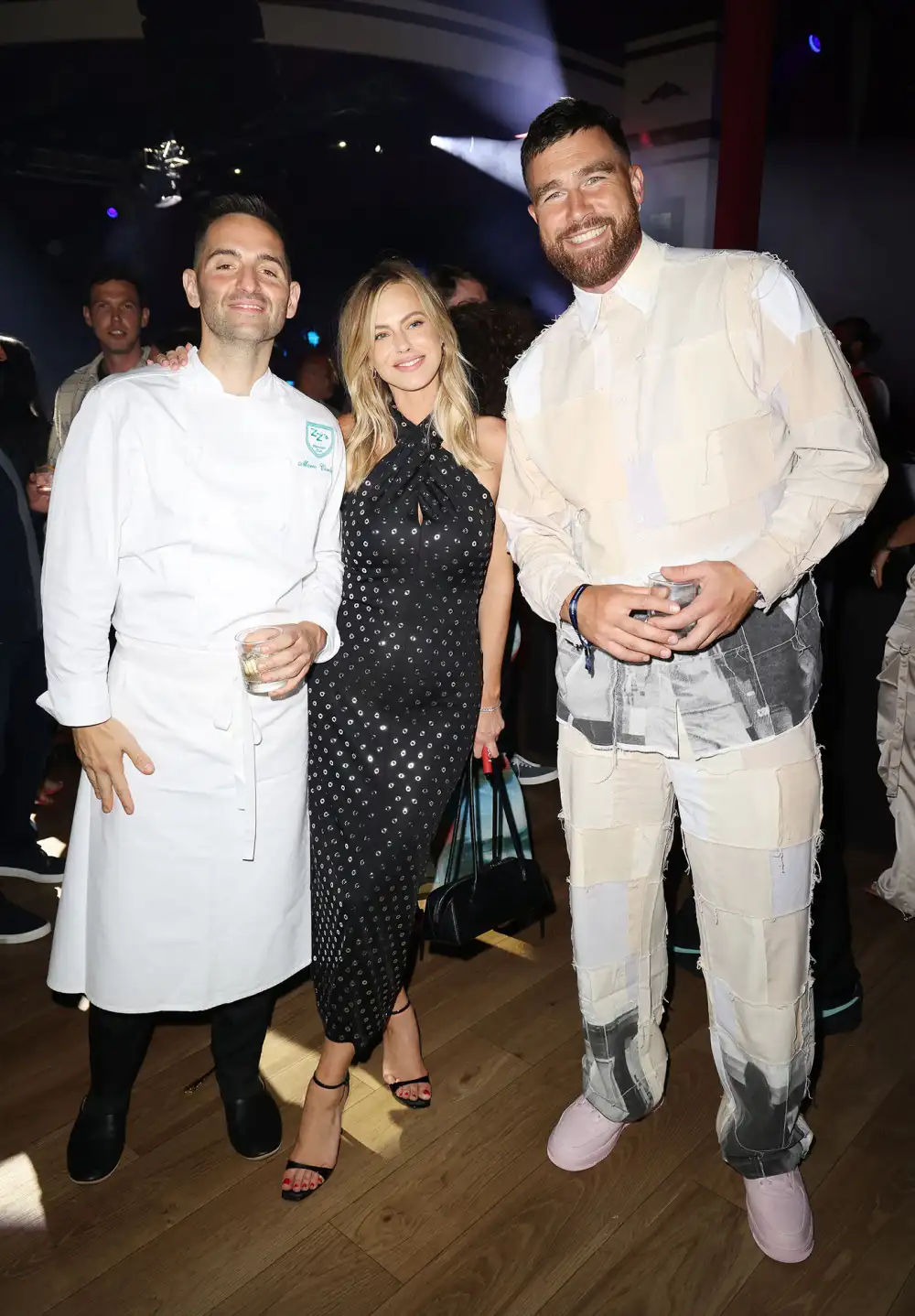 Travis Kelce Attends F1 Miami Grand Prix Party in Patchwork Two-Piece Set and Pink Sneakers