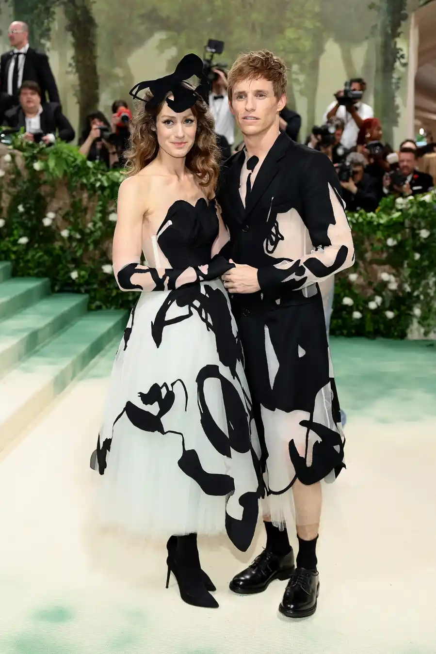 Eddie Redmayne and Wife Hannah Bagshawe Match in Black and White Skirts
