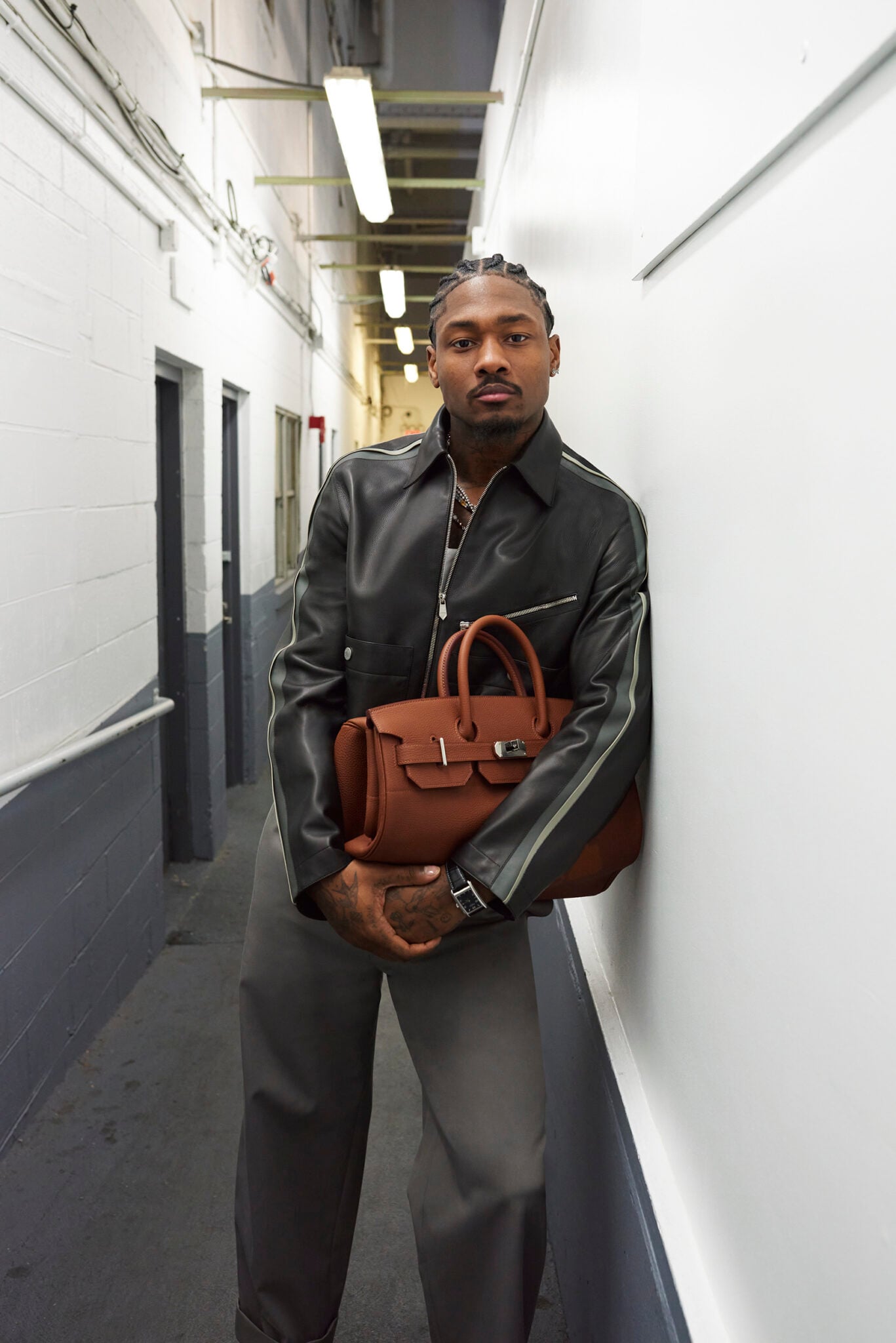 men celebs wearing hermes bags