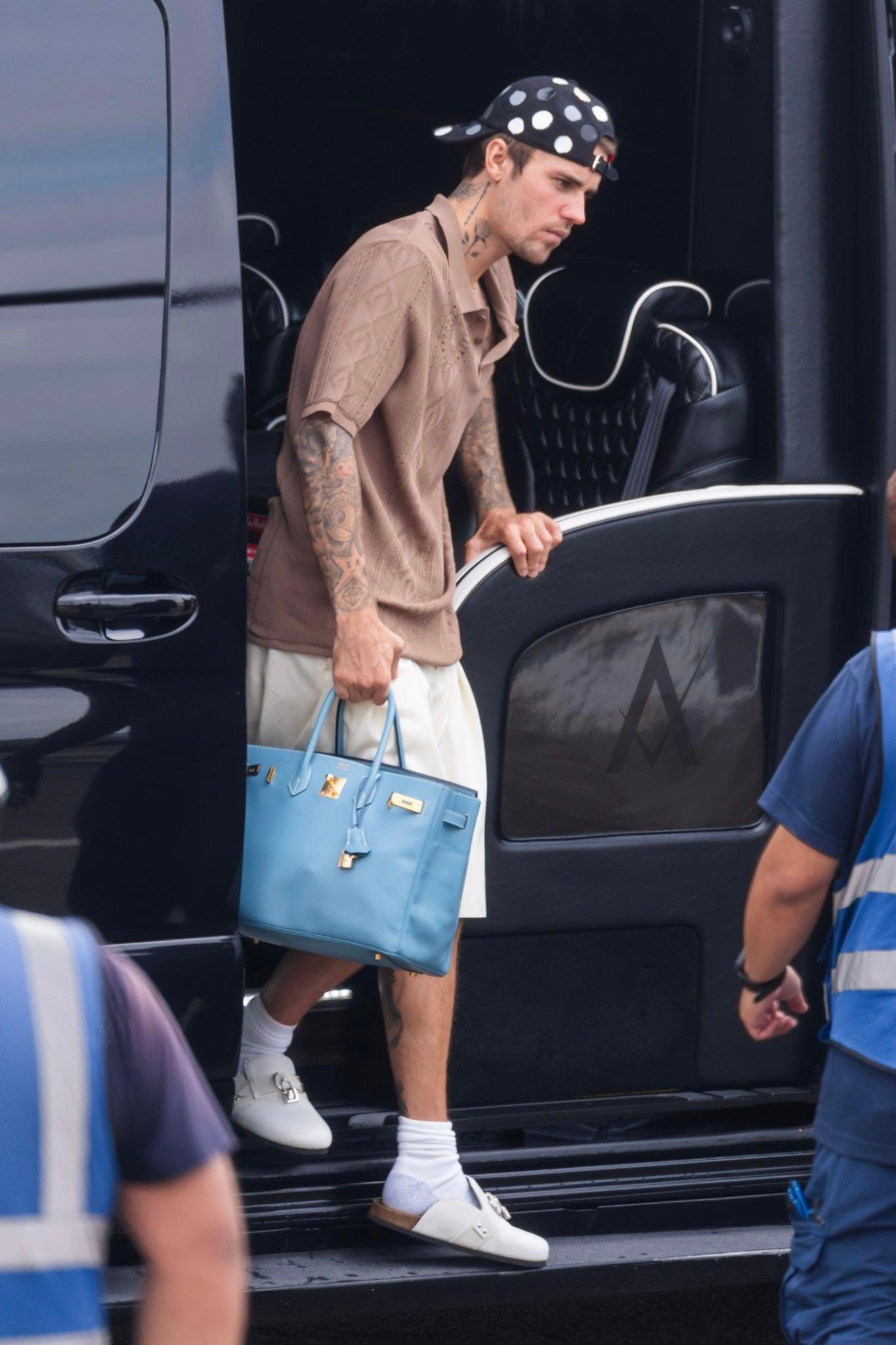 men celebs wearing hermes bags