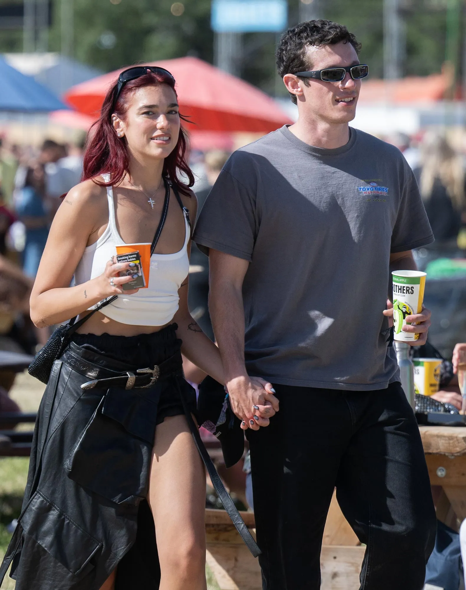 Dua Lipa and Callum Turner Sweetly Hold Hands During Date at UKs Glastonbury Festival