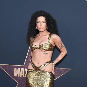 Halsey Glitters in Gold, Channels Cher at ‘MaXXXine’ Premiere