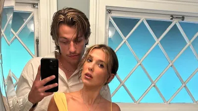 Millie Bobby Brown and Husband Jake Bongiovi Share Adorable Kiss in Photo Booth After Wedding