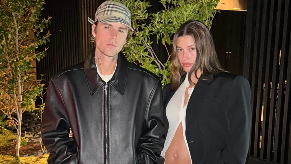 Justin Bieber Kisses Pregnant Wife Hailey While Cradling Her Baby Bump in Romantic Moment