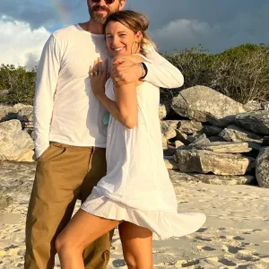 Ryan Reynolds and Blake Lively stand on beach