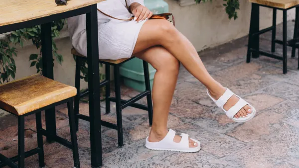 Young woman in casual clothing in sidewalk cafe in Mexico