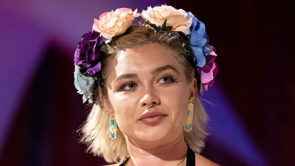 Florence Pugh Channels Her ‘Midsommar’ Film in Colorful Flower Crown at Glastonbury Q&A