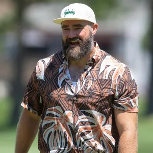 Jason Kelce Autographs Crying Baby's Onesie in the Middle of Charity Golf Tournament