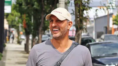 Mauricio Umansky Kisses Mystery Blonde in Greece