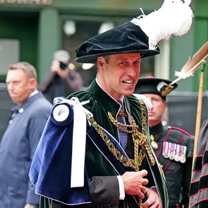 The Historical Meaning Behind Prince William Massive Ostrich Feather Hat and Ornate Velvet Robe
