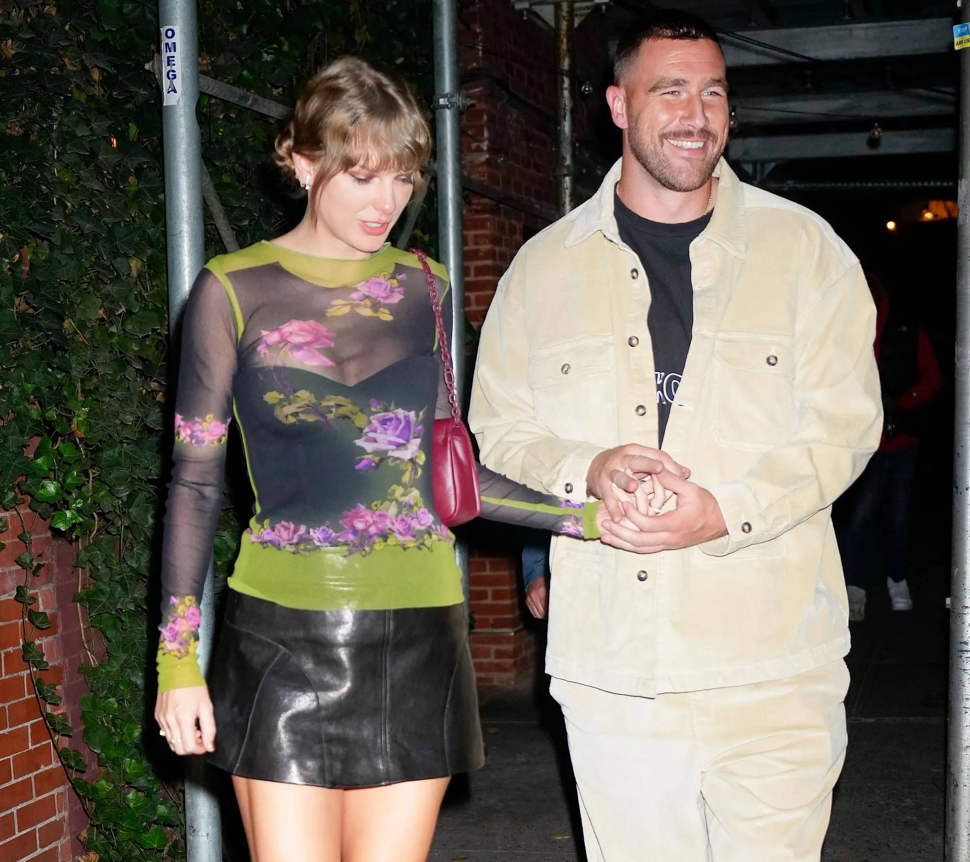 Travis Kelce Seemingly Borrows Taylor Swifts Hat While Attending Eras Concert in Dublin