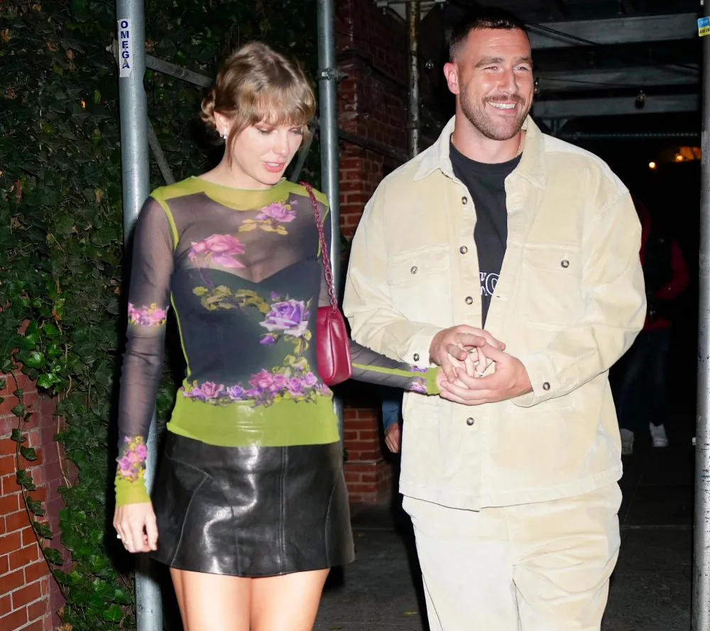 Travis Kelce Seemingly Borrows Taylor Swifts Hat While Attending Eras Concert in Dublin