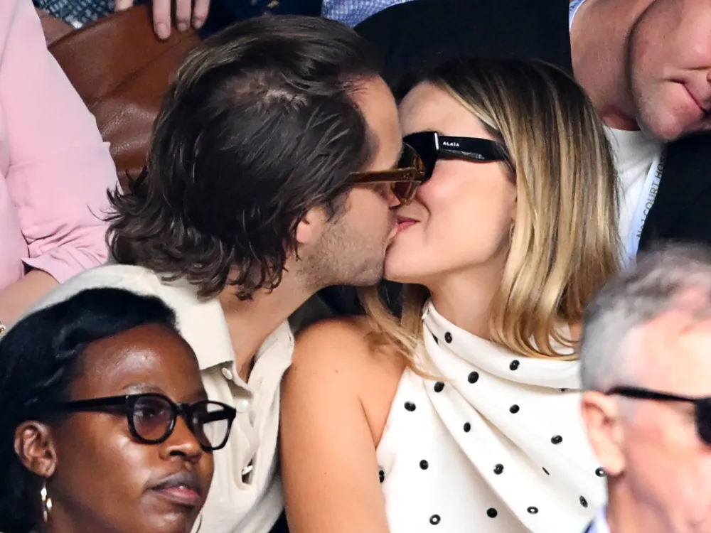 Pregnant Margot Robbie Glows at Wimbledon While Packing on the PDA With Husband Tom Ackerley