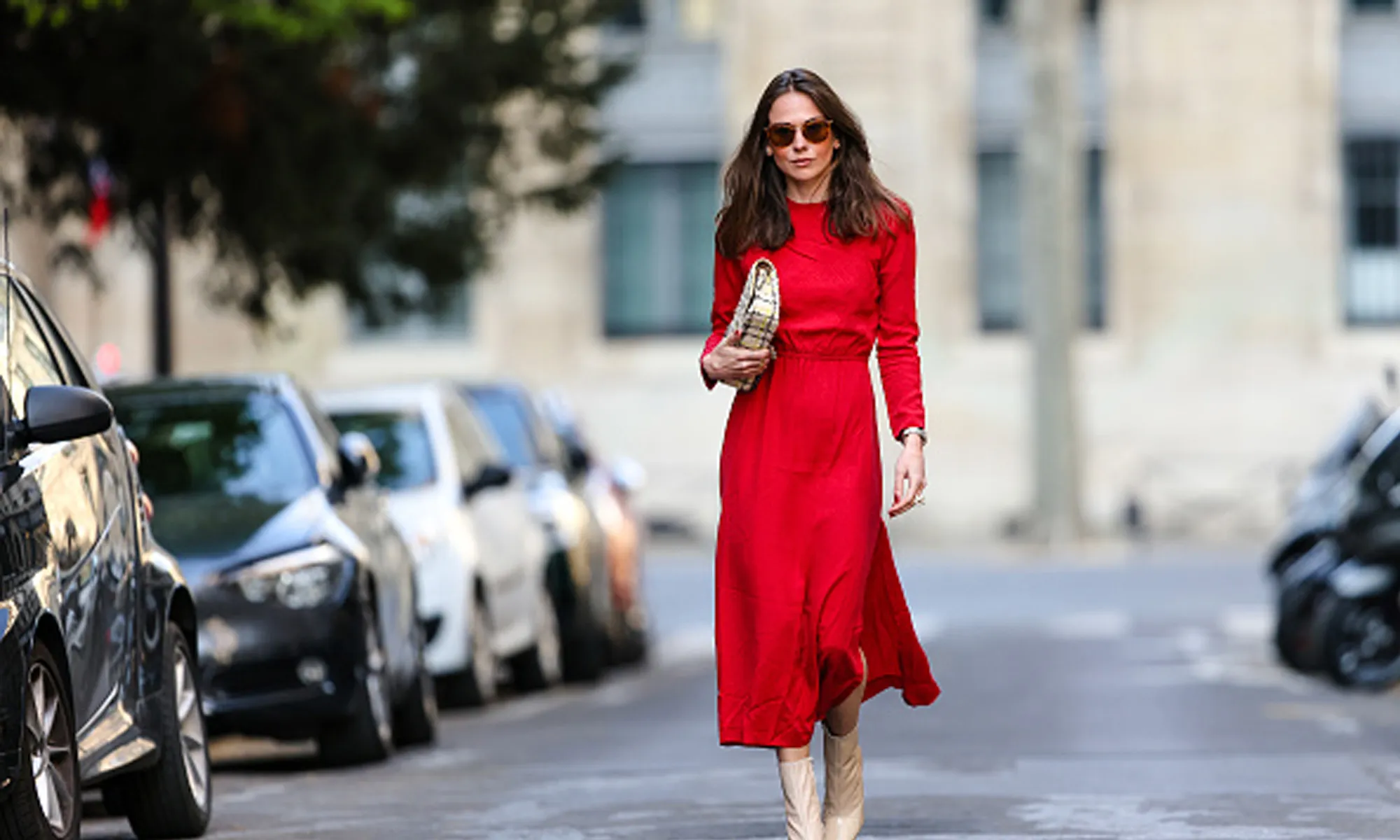 woman wearing red dress on street