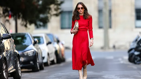 woman wearing red dress on street