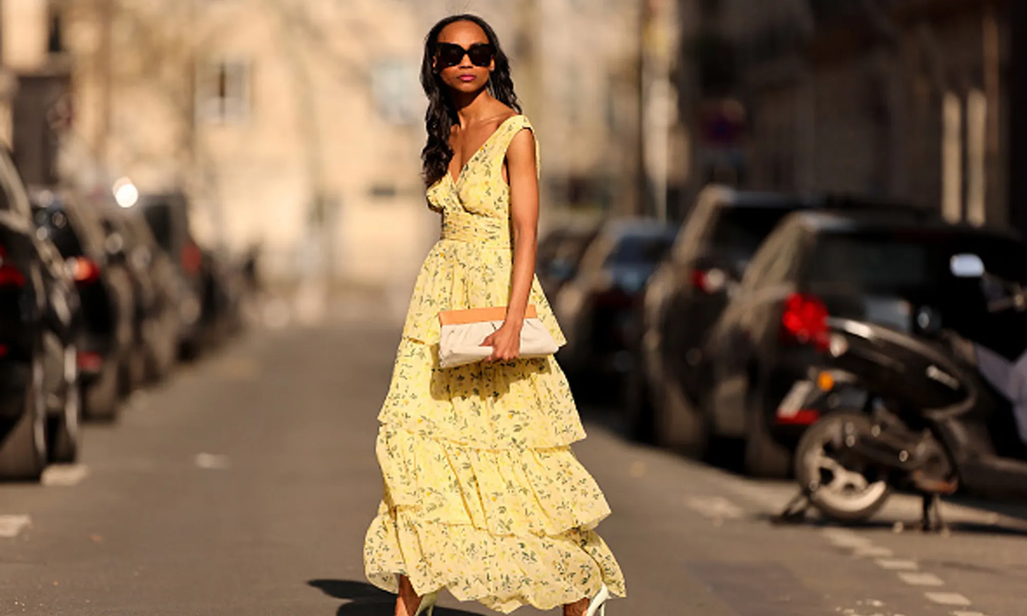 woman wearing yellow floral dress
