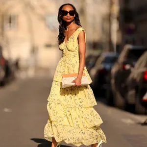 woman wearing yellow floral dress