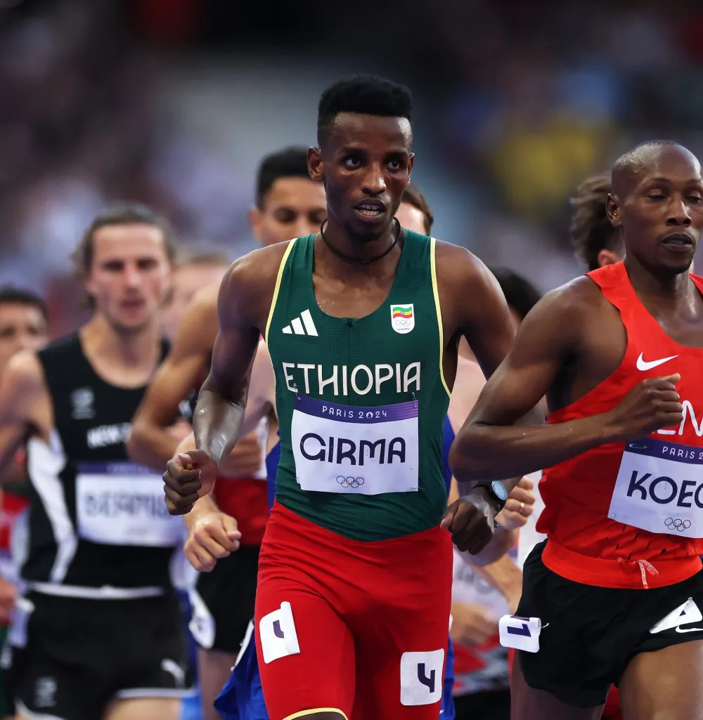 Olympic Runner Lamecha Girma Remains in Hospital Frightening Fall in Steeplechase After