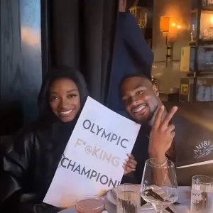 Simone Biles Poses With 'Olympic F–king Champion' Menu During Dinner With Jonathan Owens