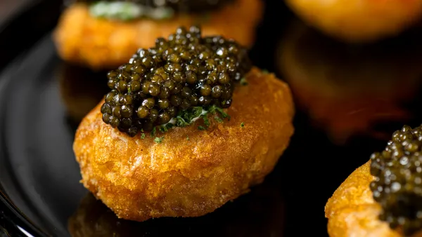 Try Caviar Topped Chicken Nuggets at the US Open 2024 from Michelin Starred Chef Simon Kim