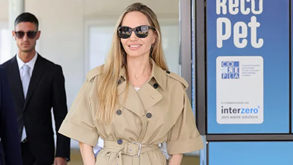 angelina jolie in beige trench coat