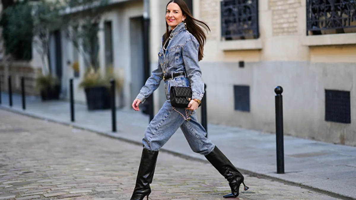 woman wearing denim jumpsuit