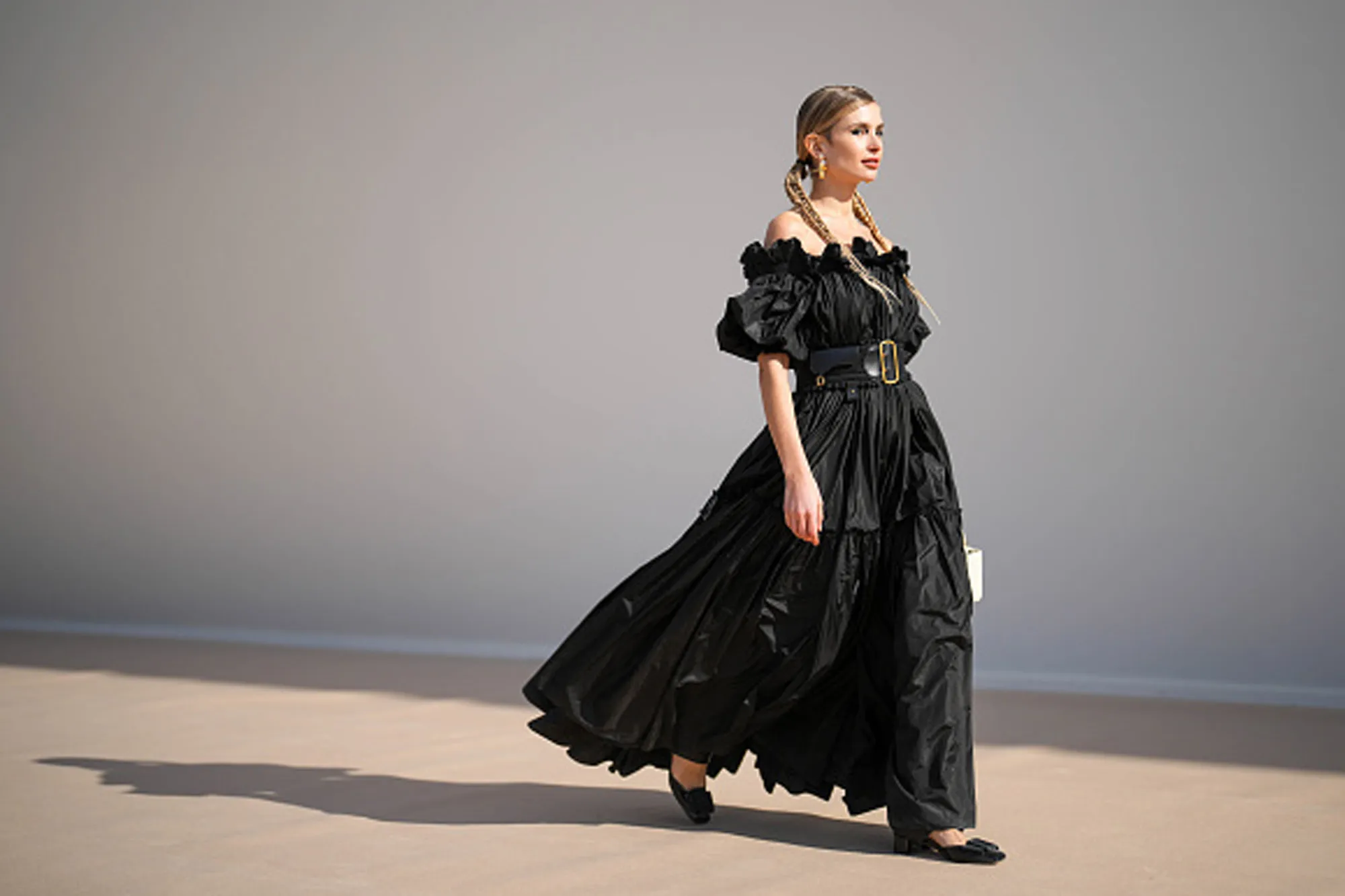 woman wearing flowy black dress