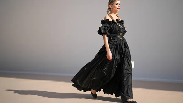 woman wearing flowy black dress