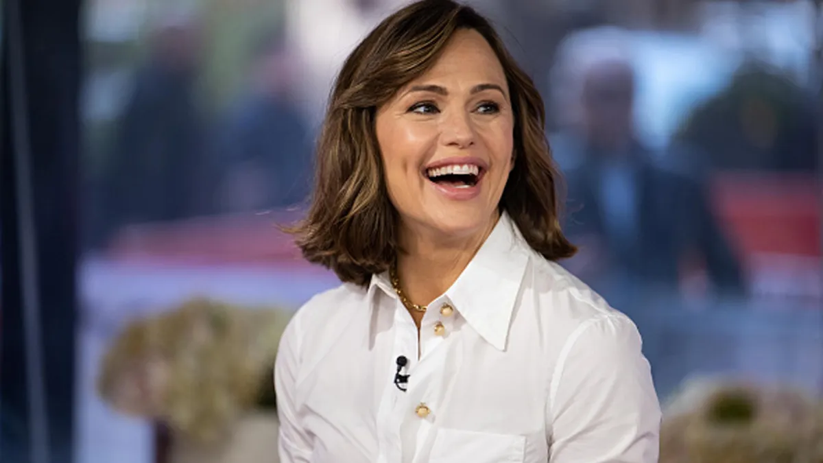 Jennifer Garner wearing white button down top