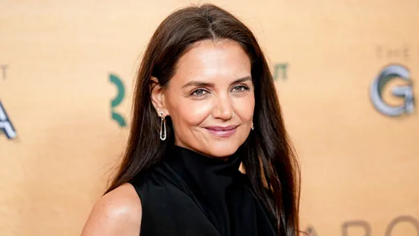 Katie Holmes in black dress on red carpet