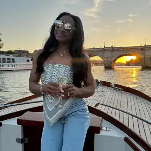 Simone Biles Quotes 'Emily in Paris' to Announce Return of Netflix Doc