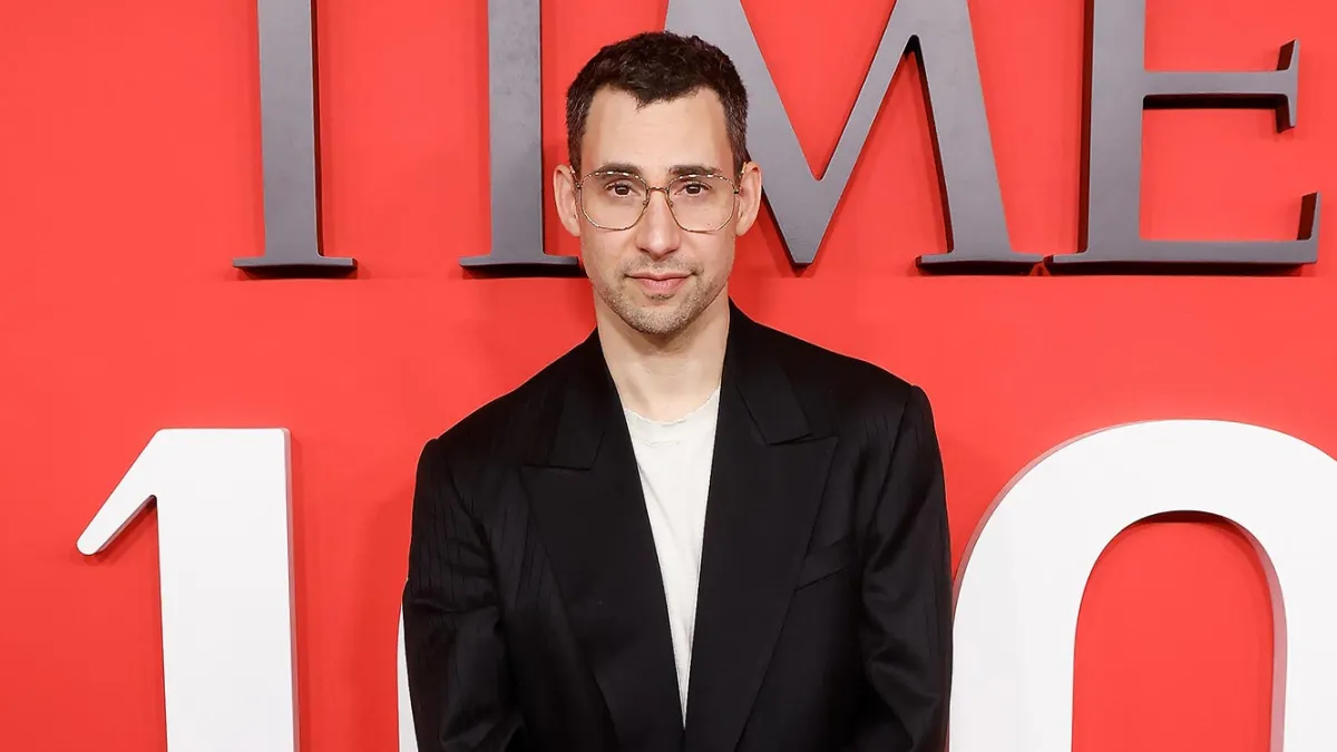 Jack Antonoff Laughs Out Loud at a William Bowery Poster Handed to Him by Fan